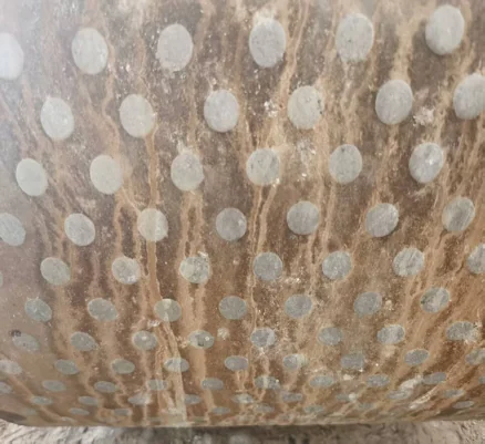 Close-up of evenly worn alloy bars